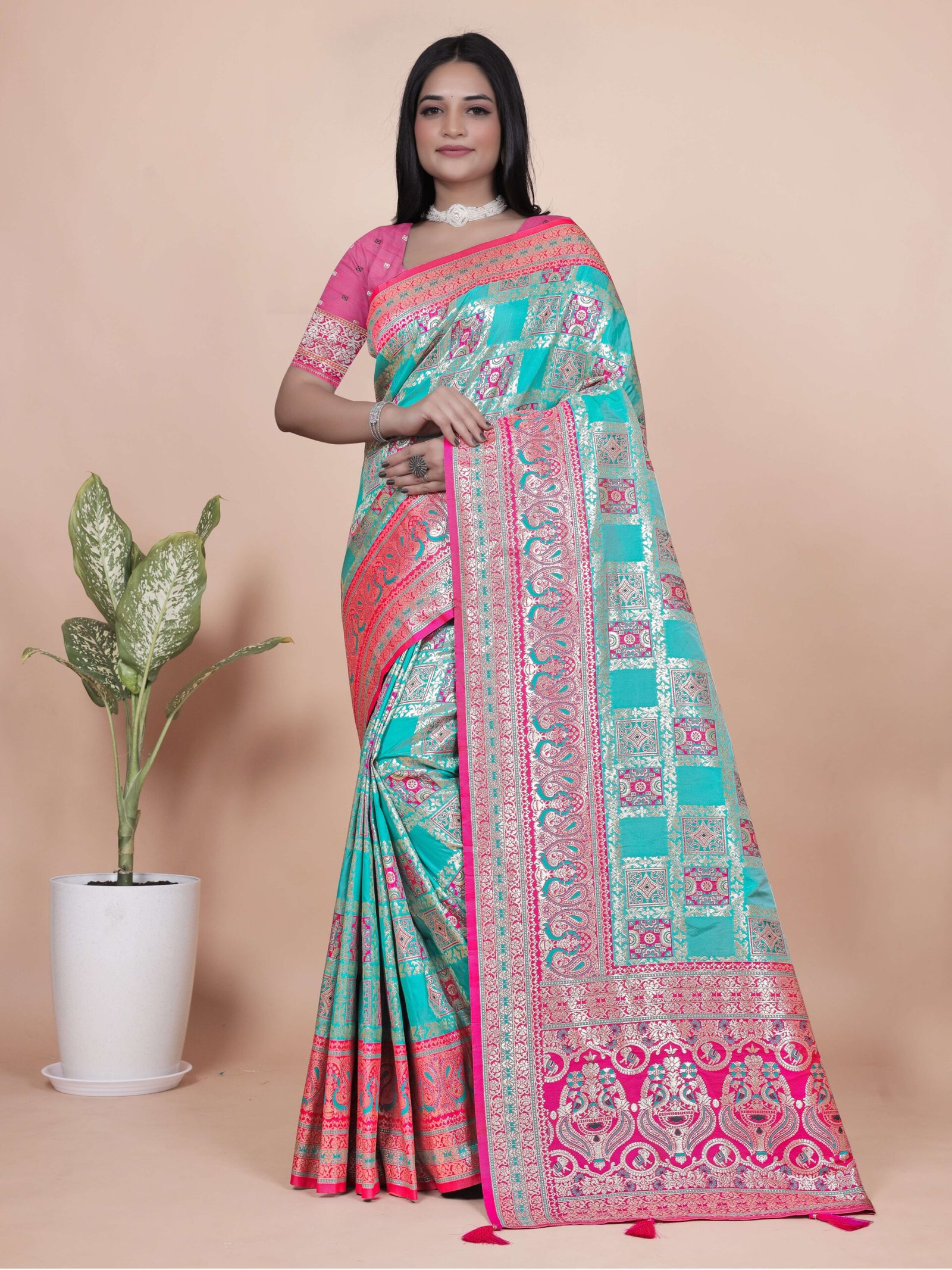 Aqua Blue and Pink Banarasi Silk Saree with Silver Zari shown in the product photograph