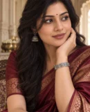 Oxidised silver-plated flower kada worn with a wine silk saree