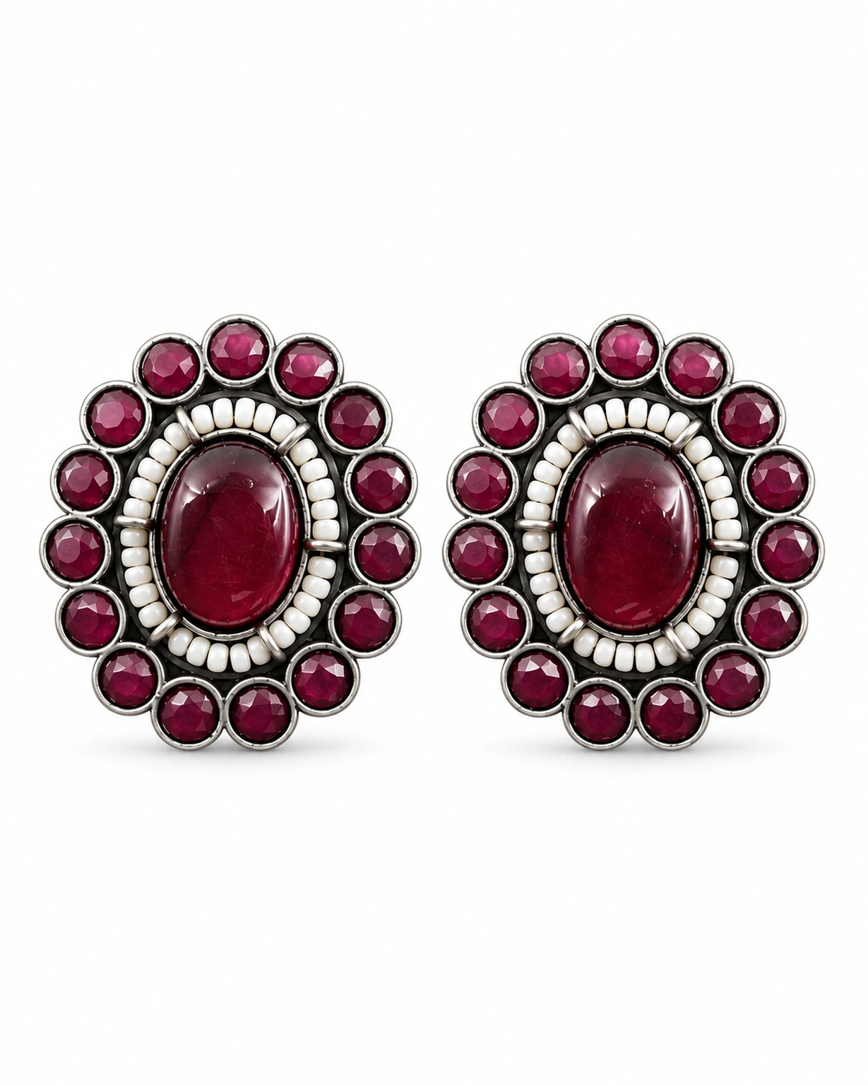 Maroon round stud earrings isolated on a pure white ecommerce background.